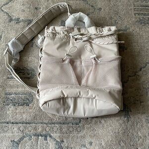 Dagne Dover Cream Sling  Backpack with Mesh Detail